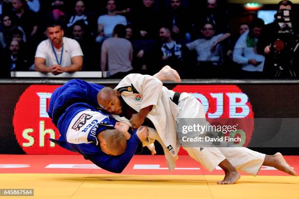 Jorge Fonseca of Portugal throws Philipp Galandi of Germany for a wazari early in their u100kg contest that he won in extra time with an ippon throw...