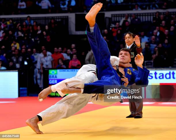 Johannes Frey of Germany , here being thrown as the referee stopped the contest, defeated Leonardo Goncalves of Brazil in extra time to win their...