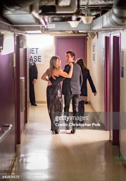 Actors Jennifer Aniston and Justin Theroux pose backstage during the 89th Annual Academy Awards at Hollywood & Highland Center on February 26, 2017...