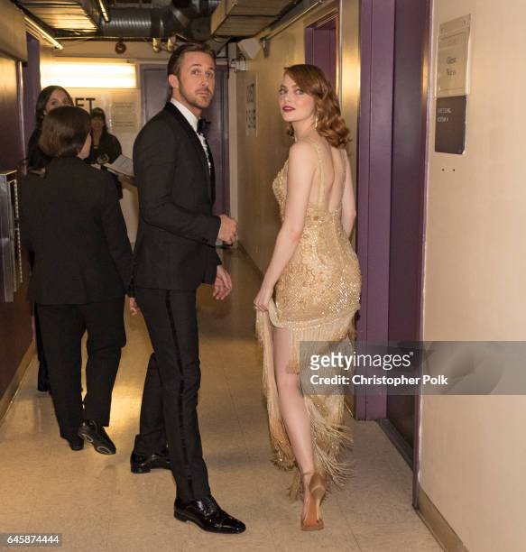 Actors Ryan Gosling and Emma Stone pose backstage during the 89th Annual Academy Awards at Hollywood & Highland Center on February 26, 2017 in...