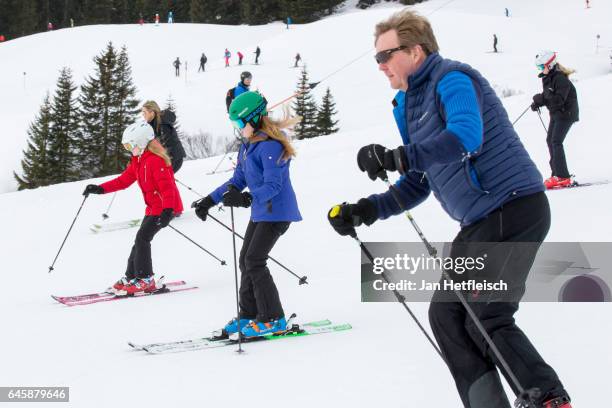 Princess Ariane, Queen Maxima, Princess Alexia, King Willem-Alexander and Princess Catharina-Amalia ski down the slope during the annual photo call...