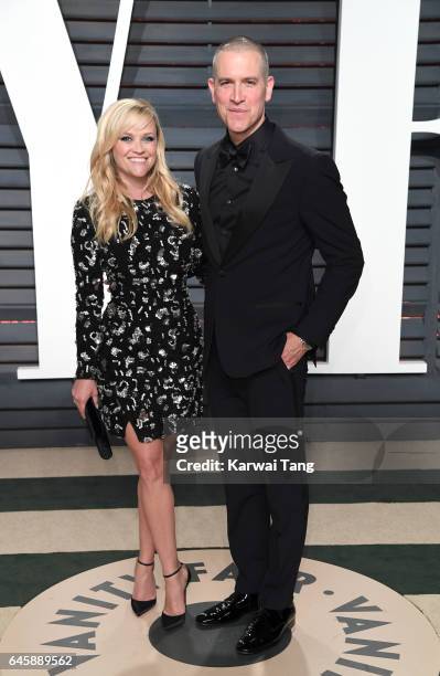 Reese Witherspoon and Jim Toth arrive for the Vanity Fair Oscar Party hosted by Graydon Carter at the Wallis Annenberg Center for the Performing Arts...