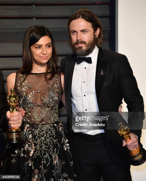 Actress Floriana Lima and actor Casey Affleck arrive at the Vanity Fair Oscar Party in Beverly Hills, California, Los Angeles on February 26, 2017.