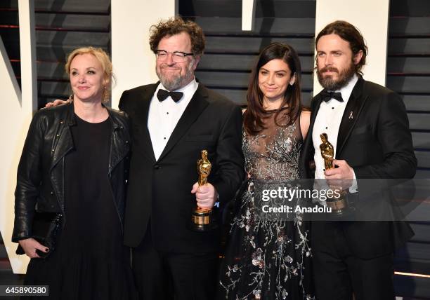 Actress J. Smith-Cameron, writer-director Kenneth Lonergan, actress Floriana Lima, and actor Casey Affleck arrive at the Vanity Fair Oscar Party in...