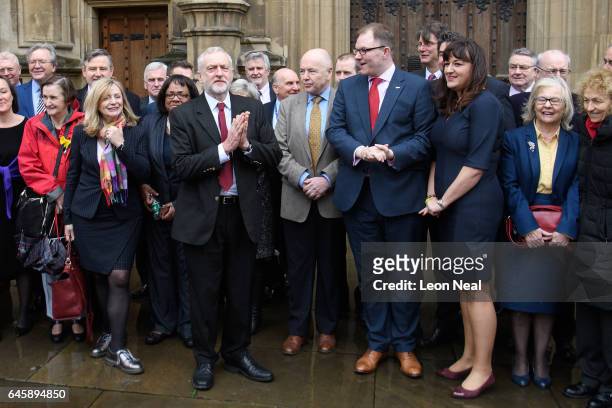 Labour Party leader Jeremy Corbyn stands with other Labour Party politicians as he welcomes the new Labour MP for Stoke Gareth Snell, outside the...