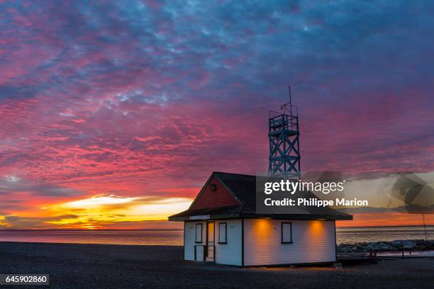 sunrise over leuty lifeguard station - woodbine and kew beach, toronto - kew cottages stock pictures, royalty-free photos & images