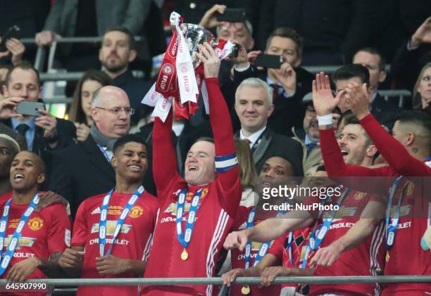 Manchester United's Wayne Rooney with Trophy during the EFL Cup Final Match between Manchester United and Southampton on February 26 at the Wembley...