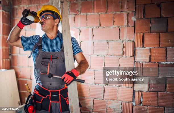 construction site worker on a break - beer goggles stock pictures, royalty-free photos & images