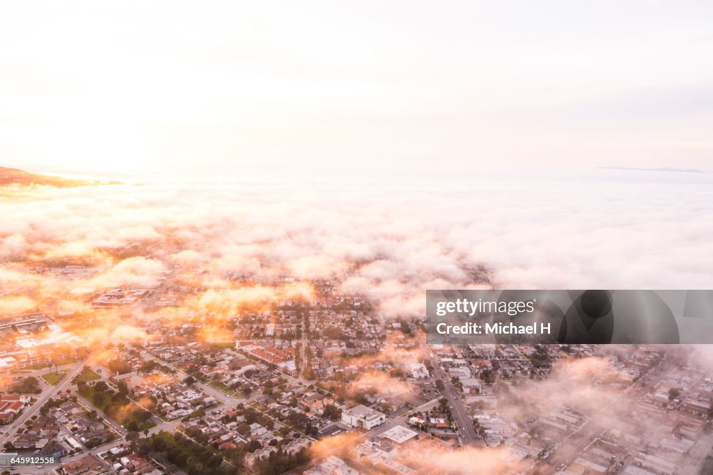 Aerial view of Los Angeles in moody sky at twilight time