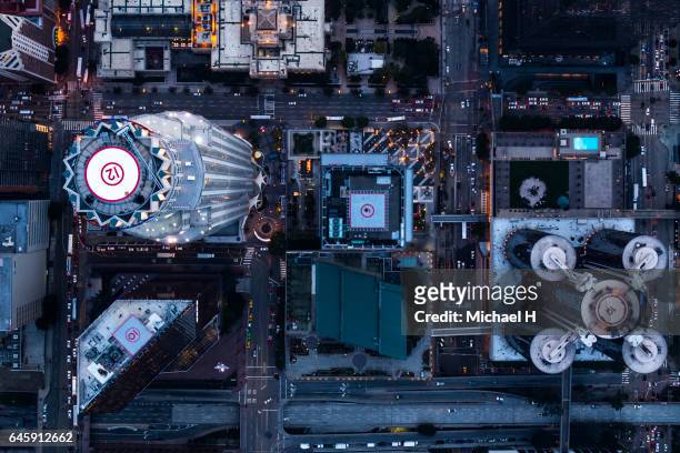 aerial view of los angeles city buildings at twilight time - aerodrome stock-fotos und bilder