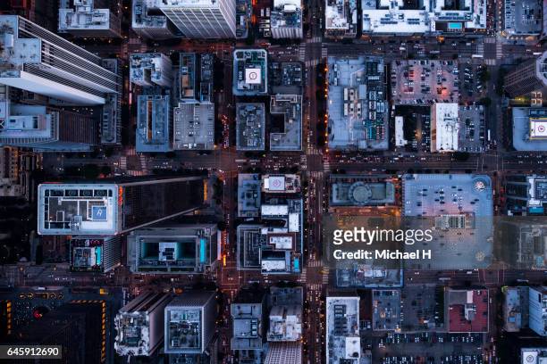 aerial view of los angeles city buildings at twilight time - downtown los angeles aerial stock pictures, royalty-free photos & images