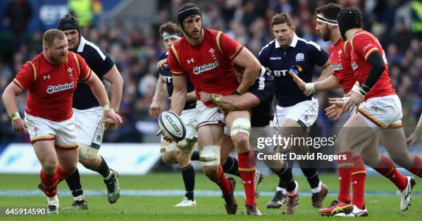 Luke Charteris of Wales passes the ball during the RBS Six Nations match between Scotland and Wales at Murrayfield Stadium on February 25, 2017 in...