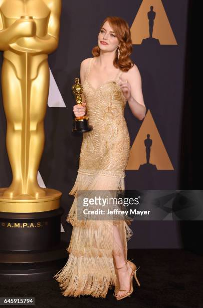 Actress Emma Stone winner of the award for Actress in a Leading Role for 'La La Land,' poses in the press room during the 89th Annual Academy Awards...