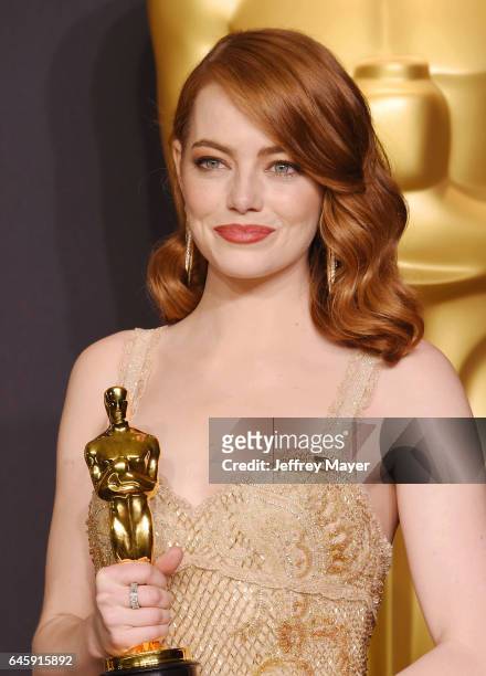 Actress Emma Stone winner of the award for Actress in a Leading Role for 'La La Land,' poses in the press room during the 89th Annual Academy Awards...