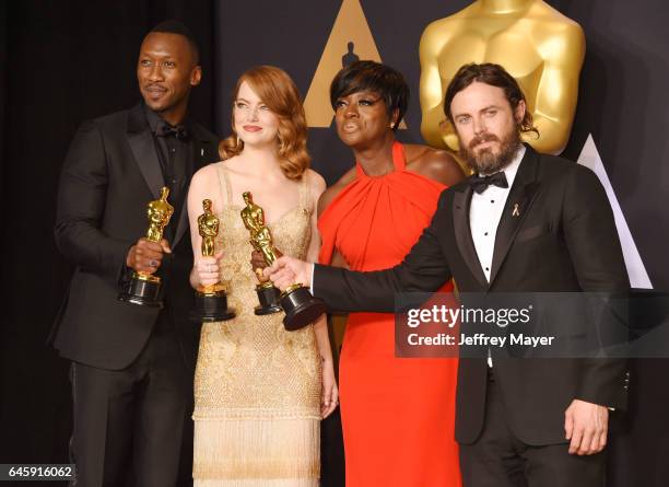 Actors Mahersala Ali, winner of the award for Actor in a Supporting Role for 'Moonlight,' Emma Stone, winner of the award for Actress in a Leading...