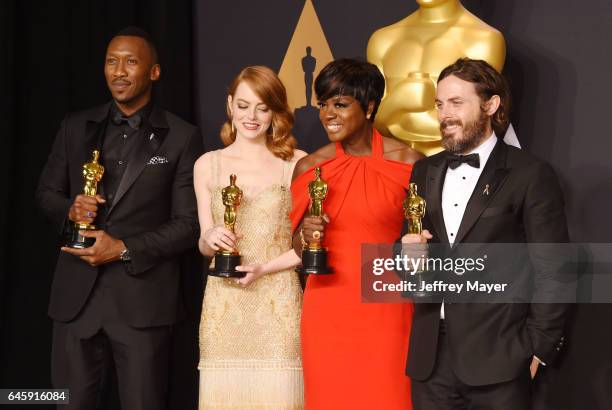 Actors Mahersala Ali, winner of the award for Actor in a Supporting Role for 'Moonlight,' Emma Stone, winner of the award for Actress in a Leading...