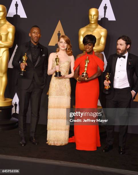 Actors Mahersala Ali, winner of the award for Actor in a Supporting Role for 'Moonlight,' Emma Stone, winner of the award for Actress in a Leading...