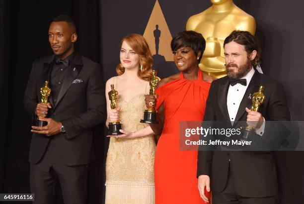 Actors Mahersala Ali, winner of the award for Actor in a Supporting Role for 'Moonlight,' Emma Stone, winner of the award for Actress in a Leading...