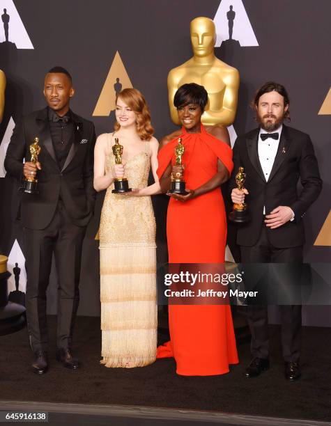 Actors Mahersala Ali, winner of the award for Actor in a Supporting Role for 'Moonlight,' Emma Stone, winner of the award for Actress in a Leading...