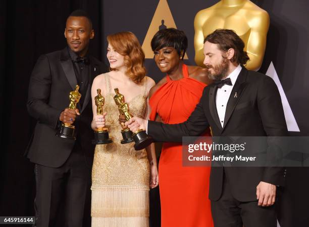 Actors Mahersala Ali, winner of the award for Actor in a Supporting Role for 'Moonlight,' Emma Stone, winner of the award for Actress in a Leading...