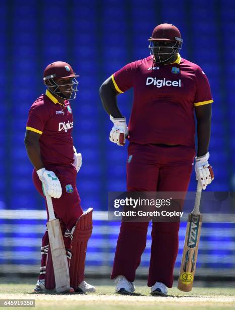 Jahmar Hamilton and Rahkeem Cornwall of WICB President's XI during the tour match between WICB President's XI and England at Warner Park on February...