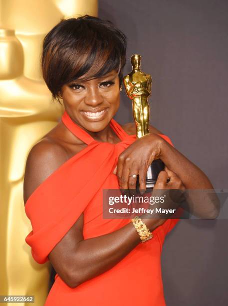 Actress Viola Davis, winner of the award for Actress in a Supporting Role for 'Fences,' poses in the press room during the 89th Annual Academy Awards...