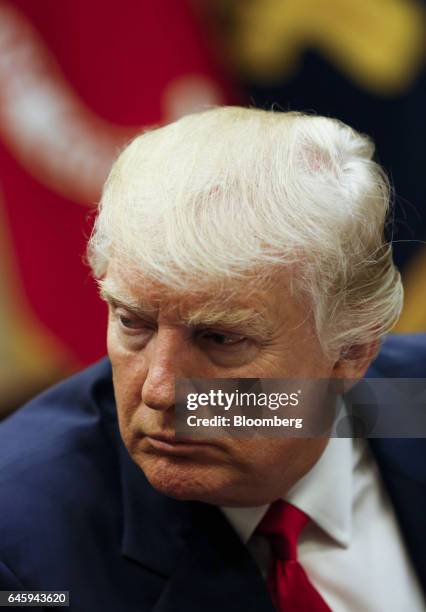 President Donald Trump listens during a listening session with health insurance company executives in the Roosevelt Room of the White House, in...