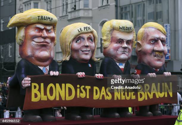 Carnival float with a papier-mache caricatures of Donald Trump, Marine Le Pen, Geert Wilders and Adolf Hitler is seen during the traditional Rose...