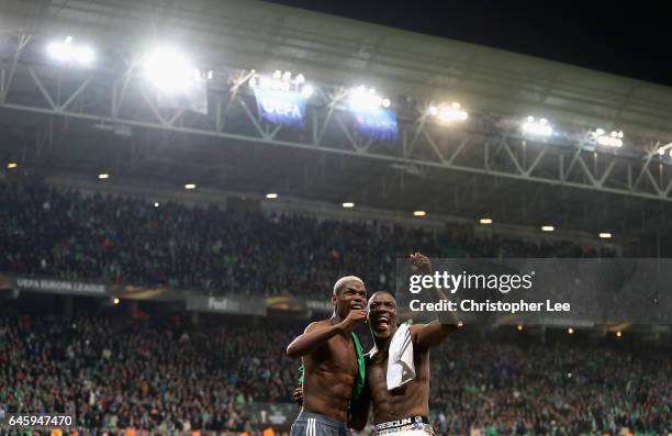 Paul Pogba of Manchester United swaps shirts and jokes with his brother Florentin Pogba of Saint-Etienne during the UEFA Europa League Round of 32...