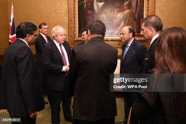 British Foreign Secretary Boris Johnson meets India's Minister of Finance Arun Jaitley, alongside a delegation of leading Indian business leaders at...