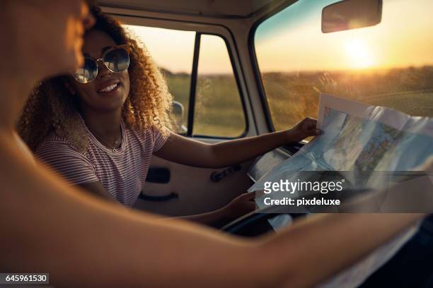 you’re more aware when you travel with friends - woman map stock pictures, royalty-free photos & images