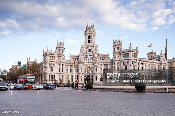 palacio de comunicaciones and plaza de la cibeles. - palacio de cibeles stock pictures, royalty-free photos & images