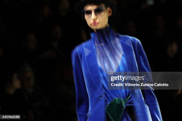 Model walks the runway at the Giorgio Armani show during Milan Fashion Week Fall/Winter 2017/18 on February 27, 2017 in Milan, Italy.