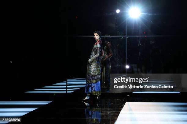 Model walks the runway at the Giorgio Armani show during Milan Fashion Week Fall/Winter 2017/18 on February 27, 2017 in Milan, Italy.