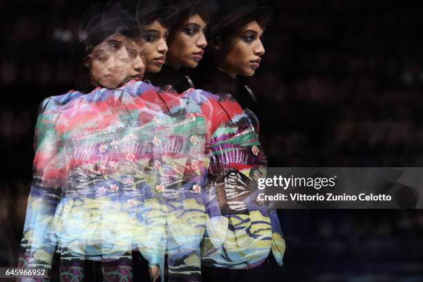 Model walks the runway at the Giorgio Armani show during Milan Fashion Week Fall/Winter 2017/18 on February 27, 2017 in Milan, Italy.