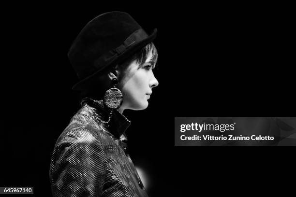 Model walks the runway at the Giorgio Armani show during Milan Fashion Week Fall/Winter 2017/18 on February 27, 2017 in Milan, Italy.