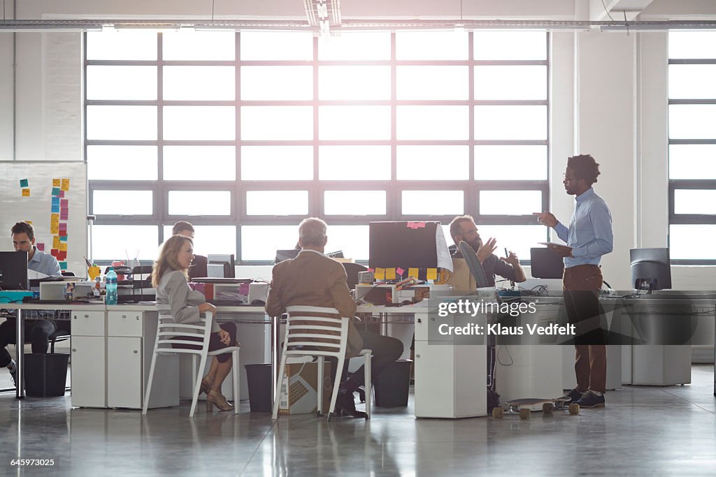 Businesspeople at large open office space