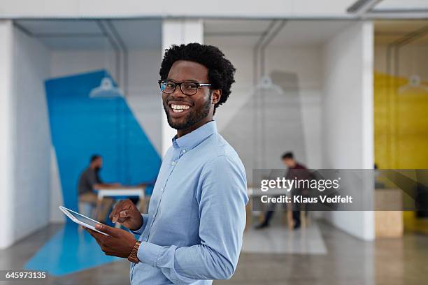 portrait of businessman at creative agency - blue shirt fotografías e imágenes de stock