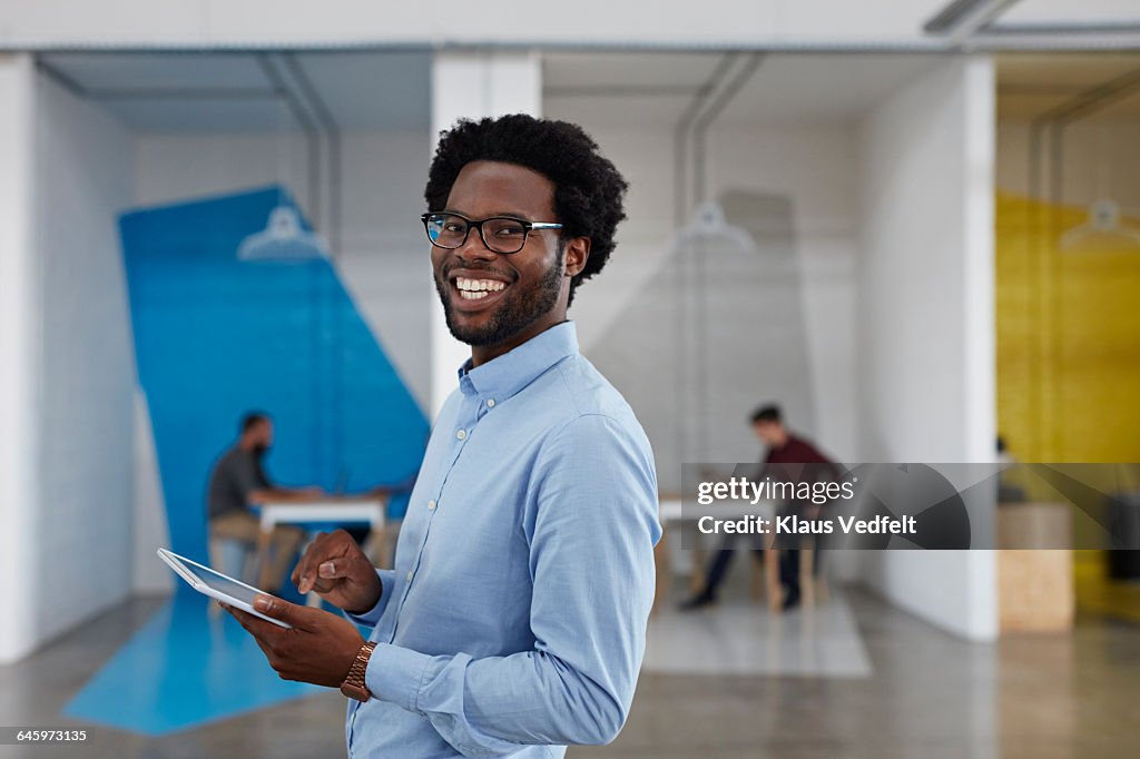 Portrait of businessman at creative agency