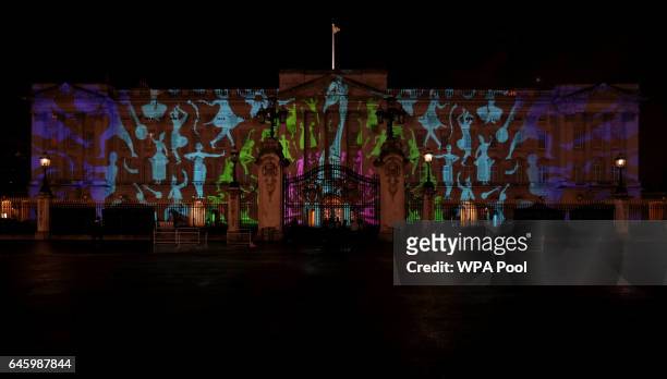Projection designed by Studio Carrom, the Bangalore and London-based design studio, of a peacock and dancing figures on the facade of Buckingham...