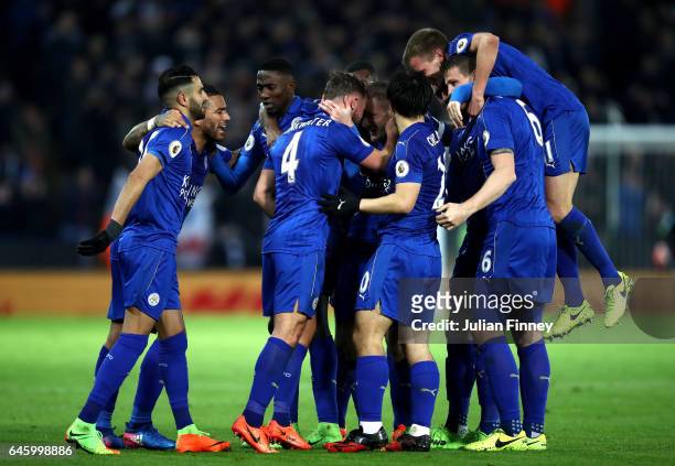 Daniel Drinkwater of Leicester City celebrates with team mates after scoring his sides second goal during the Premier League match between Leicester...