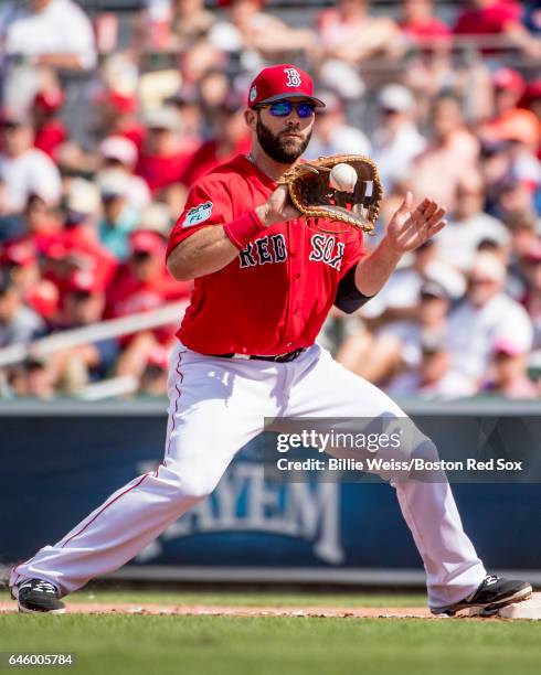 Mitch Moreland of the Boston Red Sox catches a thrown ball during the fourth inning of a Spring Training game against the St. Louis Cardinals on...