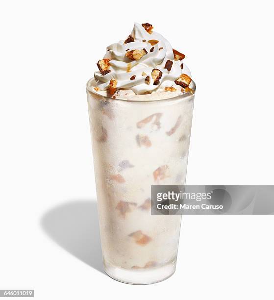 milkshake with candy crumble and whipped cream - whipped cream stock pictures, royalty-free photos & images