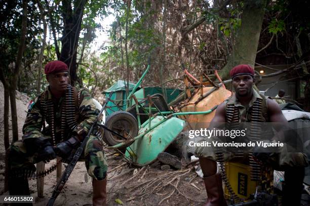 Militants working under Ateke Tom, the big chief of the MEND , in camp nine, which is just one of the eleven camps he rules in the mangroves of the...