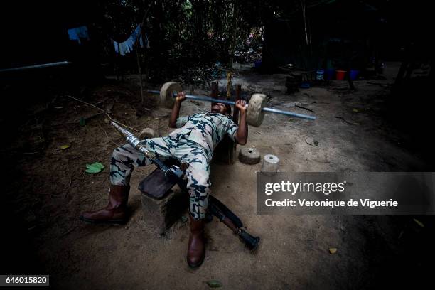 Militants working under Ateke Tom, the big chief of the MEND , working out in camp nine, which is just one of the eleven camps he rules in the...