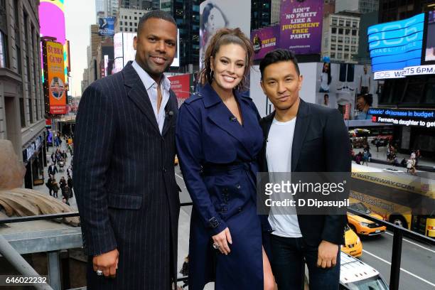 Calloway, Ashley Graham, and Prabal Gurung pose on the set of "Extra" at their New York studios at the Hard Rock Cafe in Times Square on February 27,...
