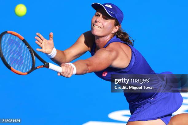 Varvara Lepchenko of USA takes a backhand shot during a first round match between Kristina Mladenovic of France and Varvara Lepchenko of USA as part...