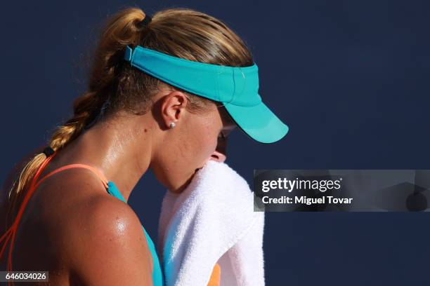Kristina Mladenovic of France dries his face during a first round match between Kristina Mladenovic of France and Varvara Lepchenko of USA as part of...