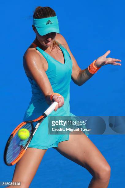 Kristina Mladenovic of France takes a forehand shot during a first round match between Kristina Mladenovic of France and Varvara Lepchenko of USA as...
