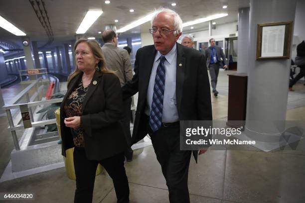 Sen. Bernie Sanders arrives with his wife Jane for the confirmation vote of Wilbur Ross for the position of Secretary of Commerce at the U.S. Capitol...